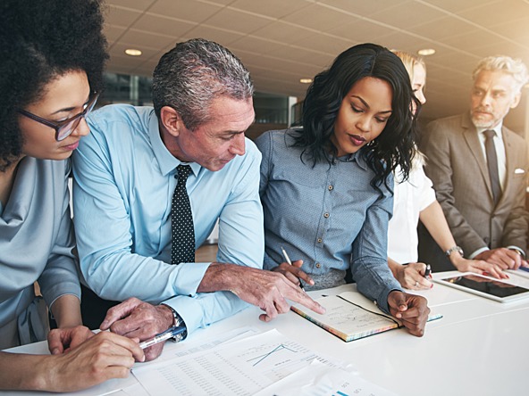 Employees discussing_crop